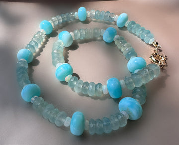 A sky-blue high-quality Peruvian blue opal beaded necklace made by hand with blue chalcedony and Ethiopian opal beads and a goldfilled bolt clasp