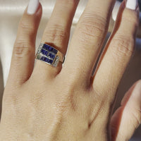 Video of 14k White Gold Antique Art Deco 1.20ctw Blue Sapphire and .30ctw Diamond Buckle-Style Crossover Ring Shown on Ring Finger