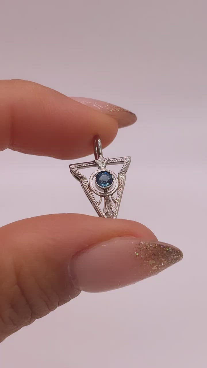 Video of A14k White Gold Art Deco Blue Sapphire and Diamond Stick Pin Conversion Upside Down Triangle Etched Detail Pendant Shown in Hand