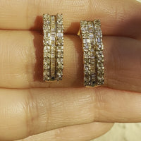 Video of Vintage 10k Yellow Gold .64ctw (I/1) Baguette and Round Diamond Huggie Earrings Shown Held in Hand