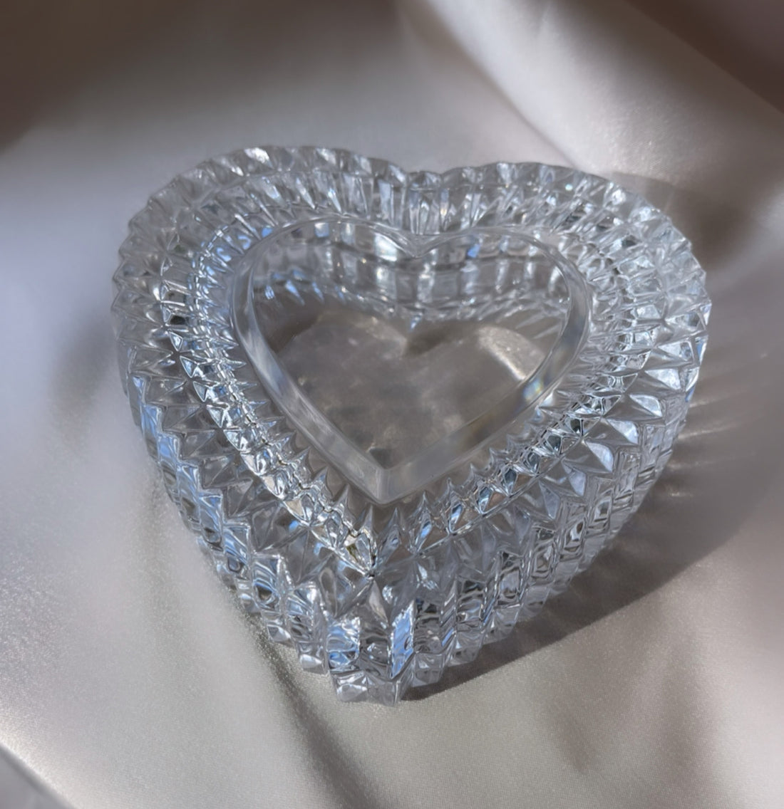 a vintage French cut crystal heart shaped box with lid