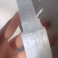 a pair of natural selenite towers