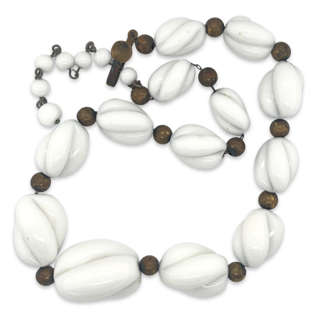 A vintage 1950s Mid Century white ceramic and metal station beaded choker necklace