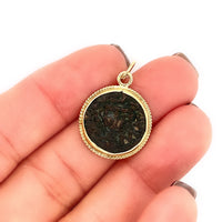 14k Yellow Gold Ancient Coin Pendant in Vintage Setting Shown in Hand