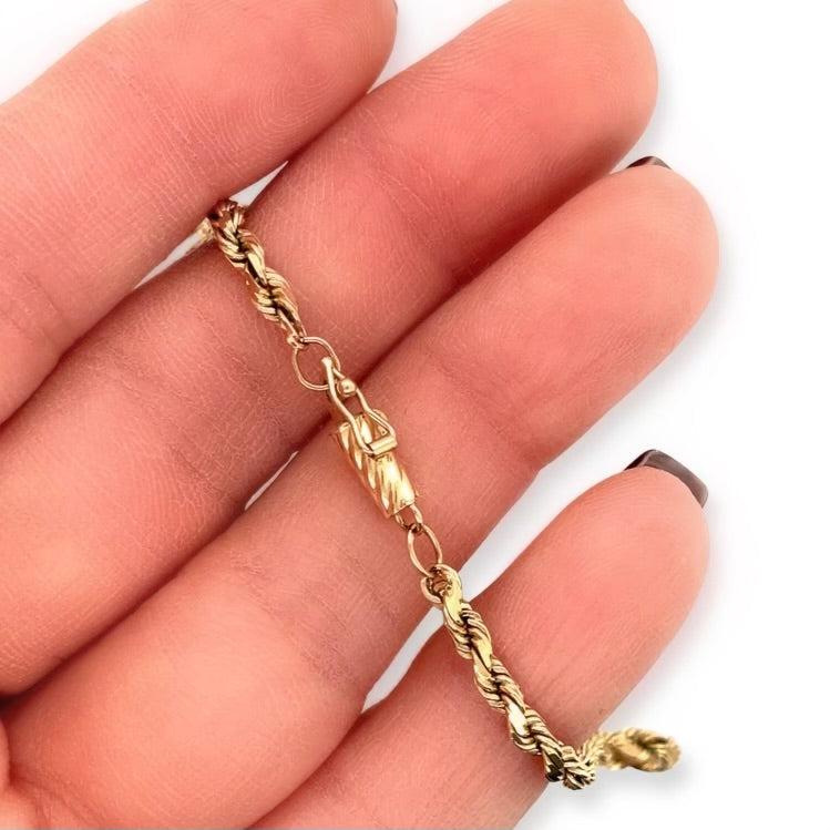 Vintage 14k Yellow Gold 8-Inch Sparkle Woven Rope Chain Bracelet with locking barrel clasp closure in hand