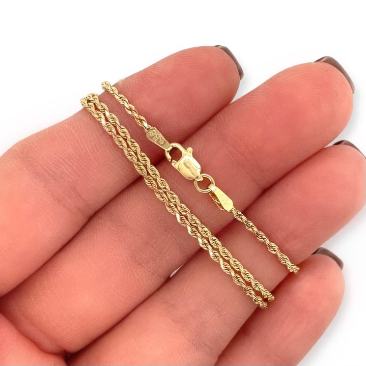 Vintage 14k Yellow Gold 20.5-inch Woven Sparkle Rope Chain Necklace in hand