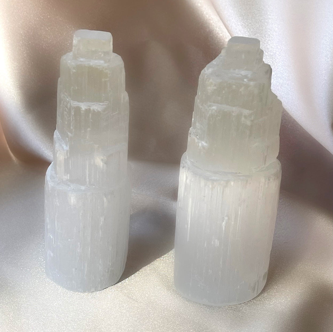 a pair of natural selenite towers