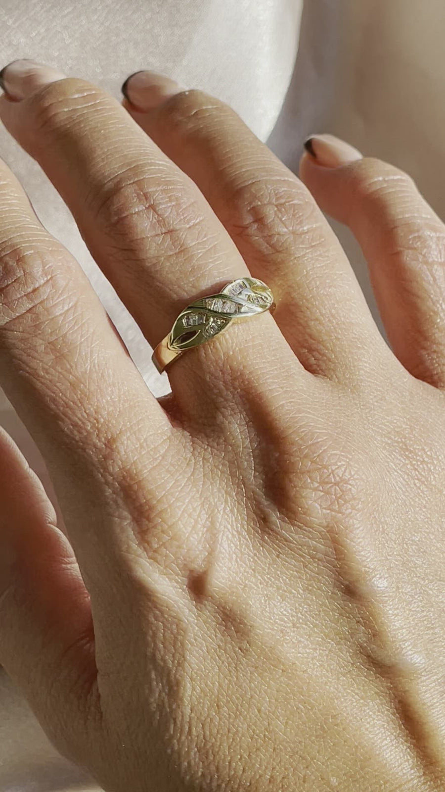 Video of Vintage 14k Yellow Gold .33ctw Baguette Diamond Ribbon-Style Infinity Symbol Ring Alternative Bridal Anniversary Gift Idea on Hand