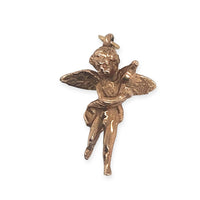 a vintage 10k rose gold 3d cherub pendant