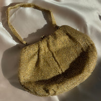 handmade in japan Delill gold beaded purse with pink silk interior, dated to 1930s