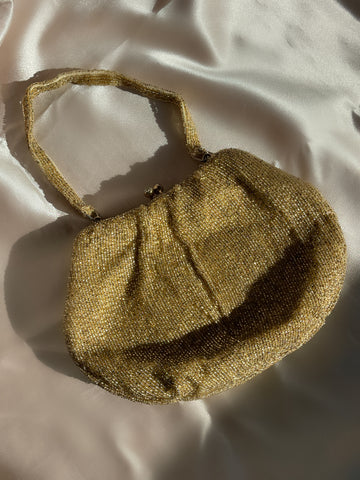 handmade in japan Delill gold beaded purse with pink silk interior, dated to 1930s